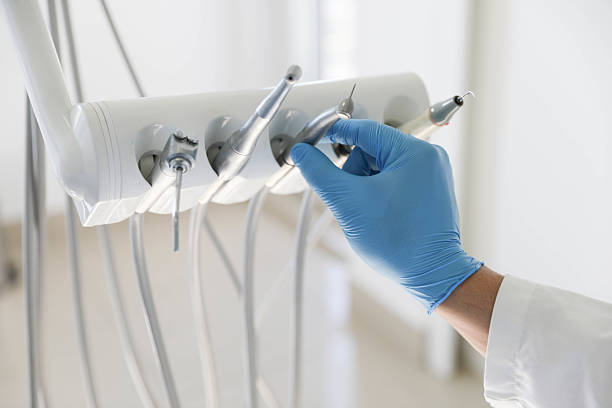 Professional Tooth Extraction technician working in Huntington, IN